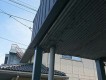ベランダの軒裏のケイカル板の排水管周りにコーキングと塗装